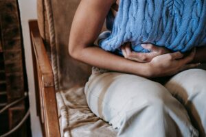 Representative Image: Woman Suffering from a Stomach Pain. Photo Source: Sora Shimazaki (Pexels)