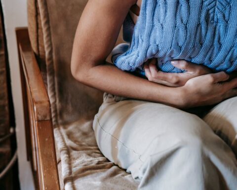 Representative Image: Woman Suffering from a Stomach Pain. Photo Source: Sora Shimazaki (Pexels)