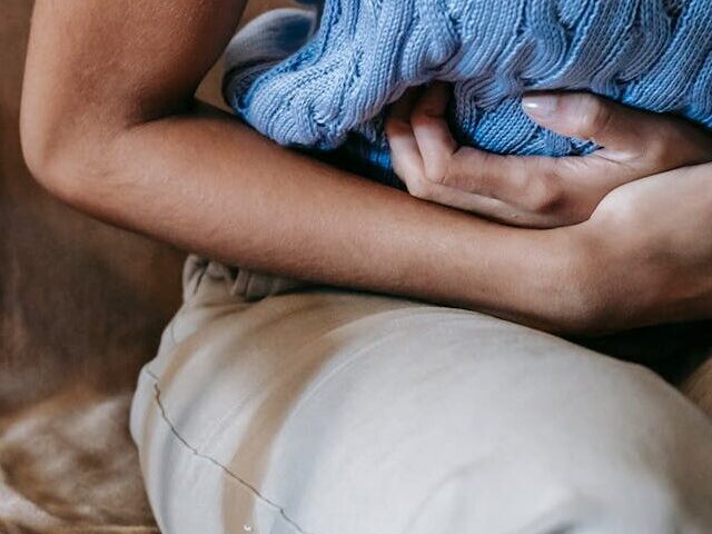 Representative Image: Woman Suffering from a Stomach Pain. Photo Source: Sora Shimazaki (Pexels)