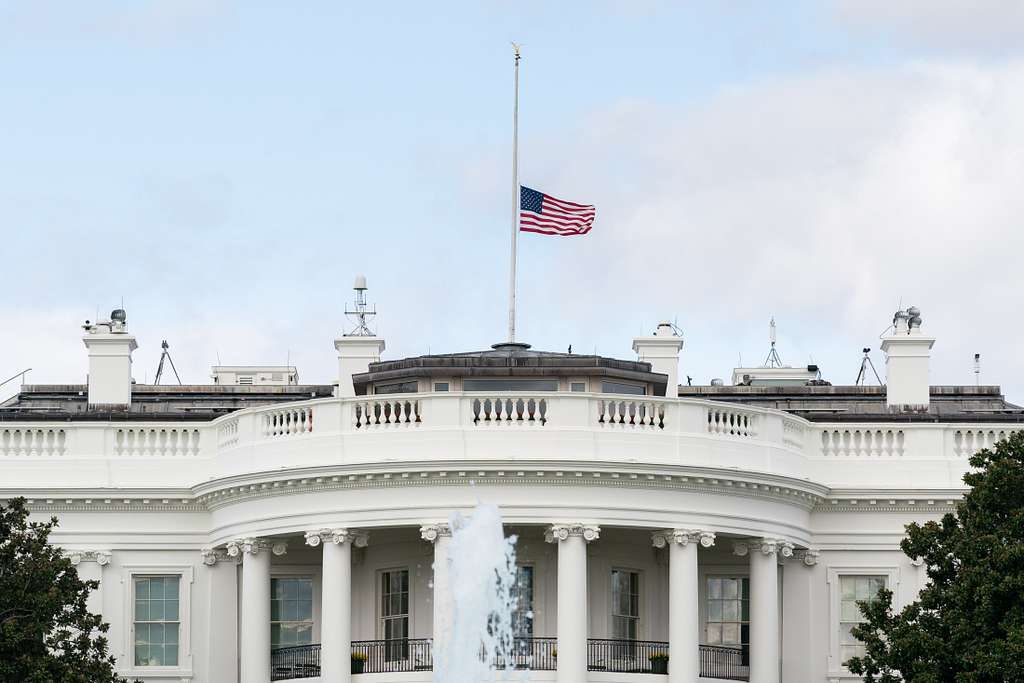 The United States Flag Flies at Half-Staff Atop the White House. Photo Source: GetArchive