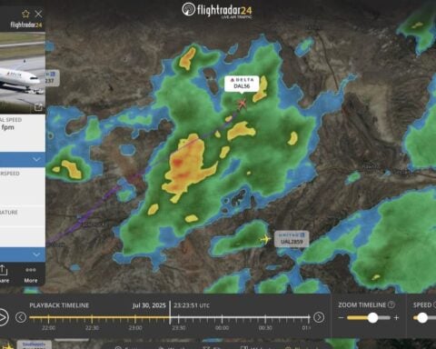 Flightradar24 map view at 23:23 UTC on July 30, 2025, showing Delta DL56’s flight path cutting through scattered green and yellow storm echoes over Wyoming and Minnesota.