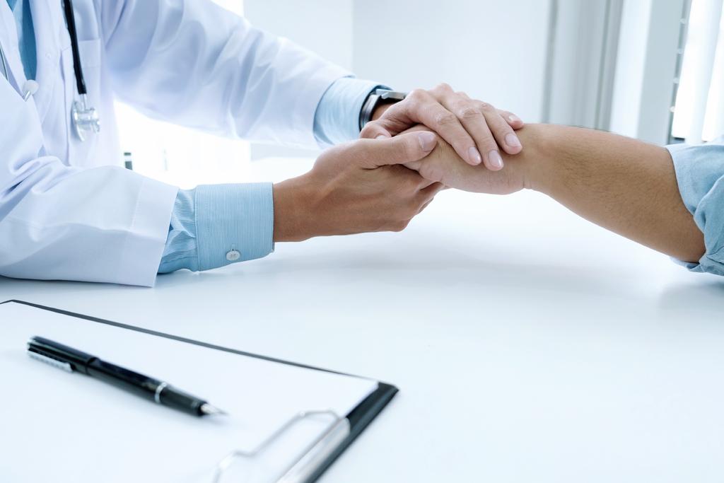 Doctor Holding Hands