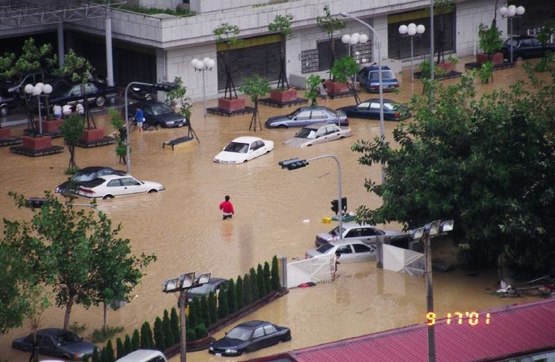 A flooded street in Taipei, September 2001. Photo Source: @tenz1225/Flickr CC BY-SA 2.0