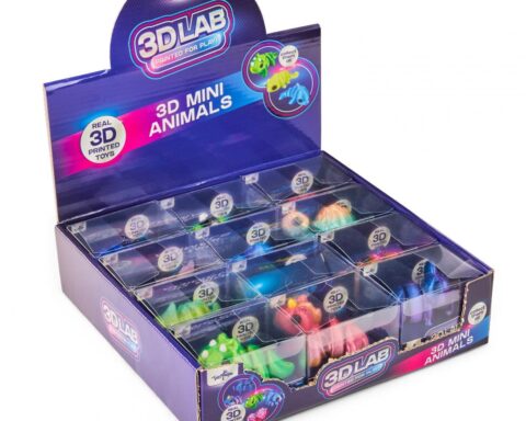 Display box of recalled 3DLAB 3D Mini Animals toys showing colorful 3D printed animal figurines in individual clear plastic compartments arranged in a retail display case with purple packaging.