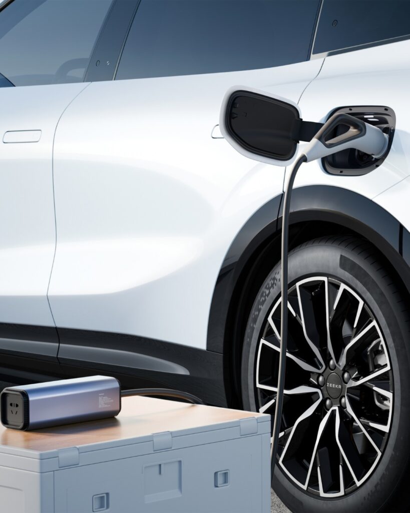  Zeekr 7X charging port with portable home charging unit connected.
