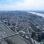Central Harlem skyline with surrounding streets and river in view, illustrating the neighborhood context relevant to current Legionnaires’ disease updates.
