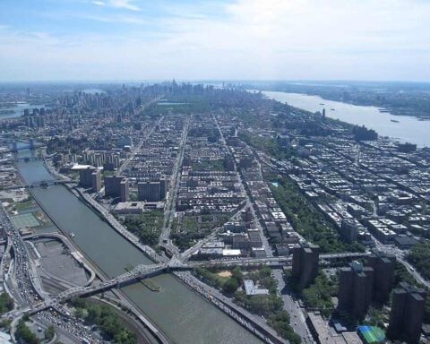 Central Harlem skyline with surrounding streets and river in view, illustrating the neighborhood context relevant to current Legionnaires’ disease updates.