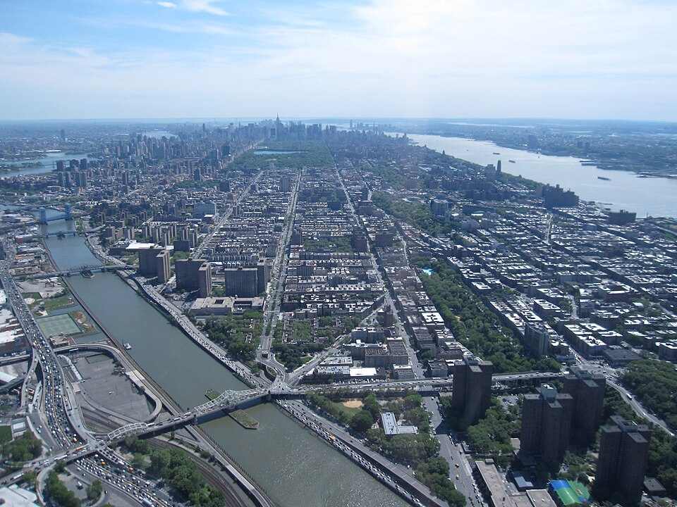 Central Harlem skyline with surrounding streets and river in view, illustrating the neighborhood context relevant to current Legionnaires’ disease updates.