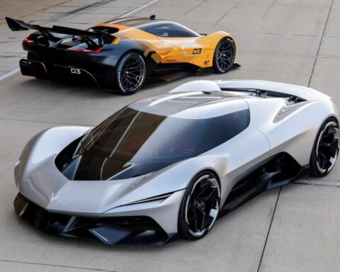 Chevrolet Corvette CX concept in white and CX.R Vision Gran Turismo concept in yellow with black racing livery, featuring aerodynamic designs with fighter jet-inspired canopies and aggressive styling