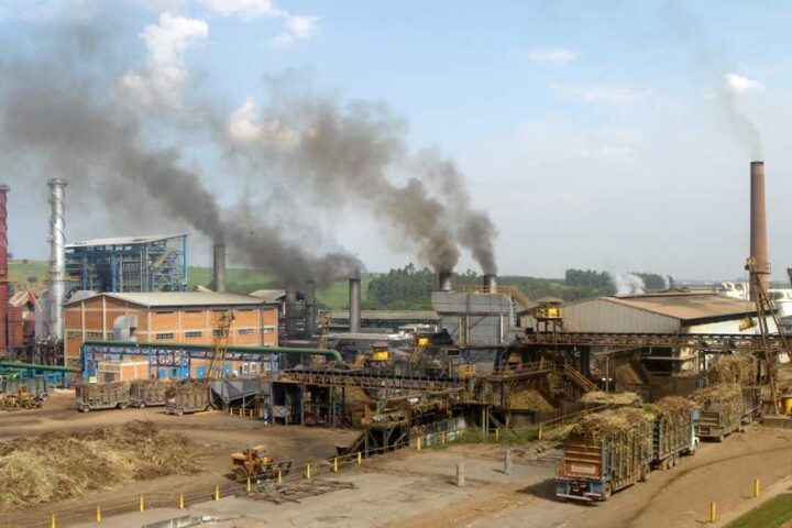 Representative Image. Panoramic view of the Costa Pinto sugar and ethanol industrial plant in Piracicaba, Brazil, showing factory buildings with smokestacks emitting smoke in an industrial setting.