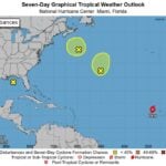 National Hurricane Center 7-Day Graphical Tropical Weather Outlook showing tropical storm Erin near the Cabo Verde Islands and two additional disturbances with yellow highlighted areas indicating potential development zones across the Atlantic basin.