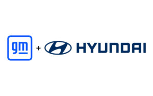 The blue GM logo and the Hyundai logo side by side with a plus sign between them on a white background.