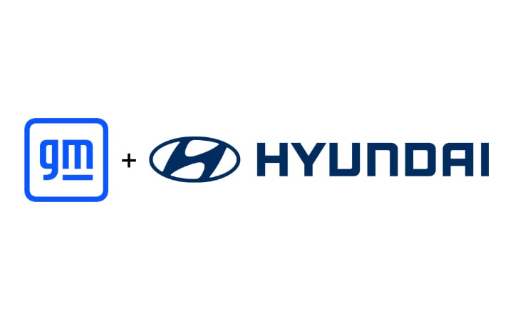 The blue GM logo and the Hyundai logo side by side with a plus sign between them on a white background.