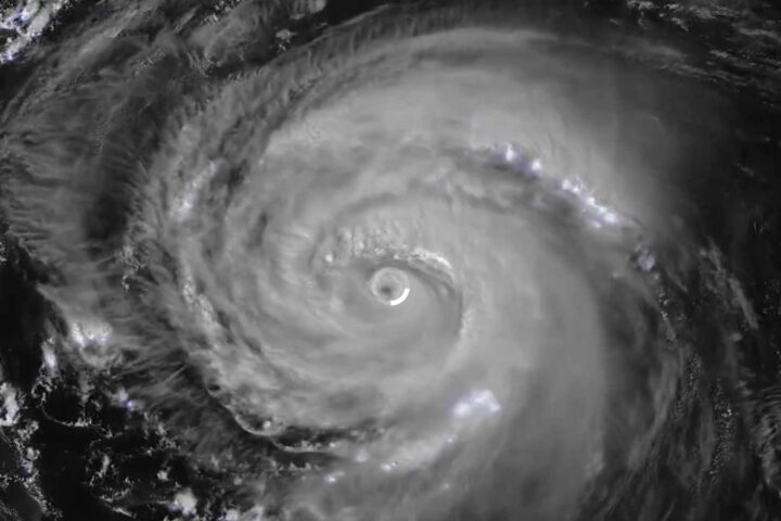 Satellite image of Hurricane Erin showing a well-defined eye surrounded by spiraling cloud bands, captured by NOAA GOES satellite on August 20, 2025.