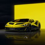 Yellow Lamborghini Fenomeno hypercar with angular design and distinctive black accents displayed against a matching yellow background, highlighting its aggressive aerodynamic styling and low-slung profile.