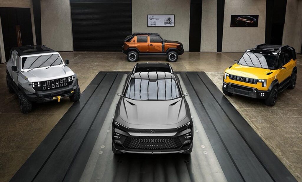 Mahindra NU_IQ concept SUVs displayed together in a studio setting during the FREEDOM_NU reveal.