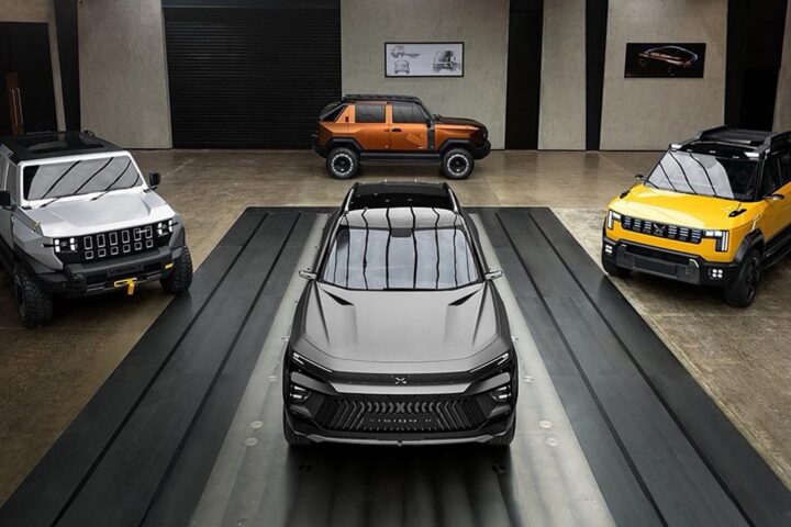 Mahindra NU_IQ concept SUVs displayed together in a studio setting during the FREEDOM_NU reveal.
