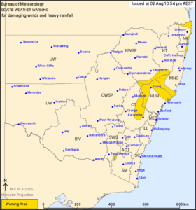 Map of New South Wales showing regions under severe weather warning for damaging winds and heavy rainfall.