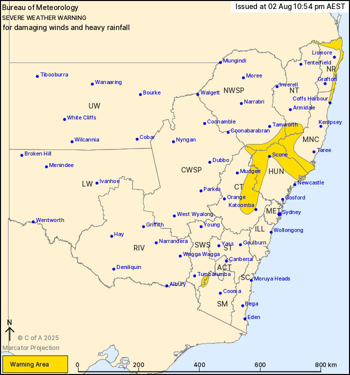 Map of New South Wales showing regions under severe weather warning for damaging winds and heavy rainfall.