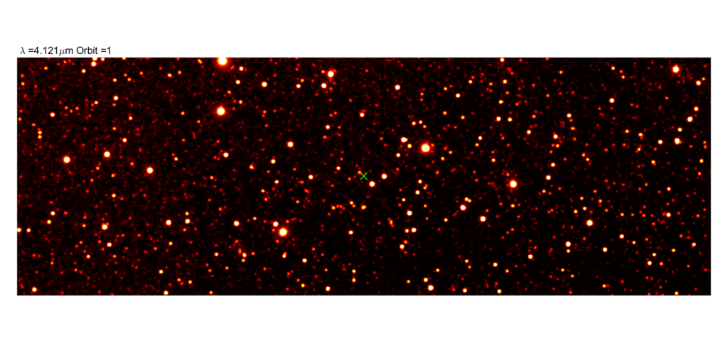 Infrared SPHEREx image showing interstellar comet 3I/ATLAS as a bright red-orange point among many fainter stars on a black background; the object is marked for reference.