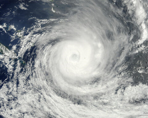 Representative satellite image illustrating a tropical cyclone over open ocean waters, used to accompany hurricane-season coverage.