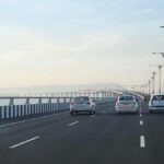 Cars moving along Atal Setu sea bridge in Mumbai, now part of Maharashtra’s electric vehicle toll exemption policy.