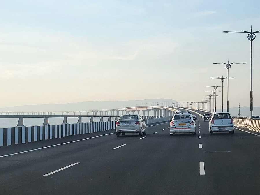 Cars moving along Atal Setu sea bridge in Mumbai, now part of Maharashtra’s electric vehicle toll exemption policy.
