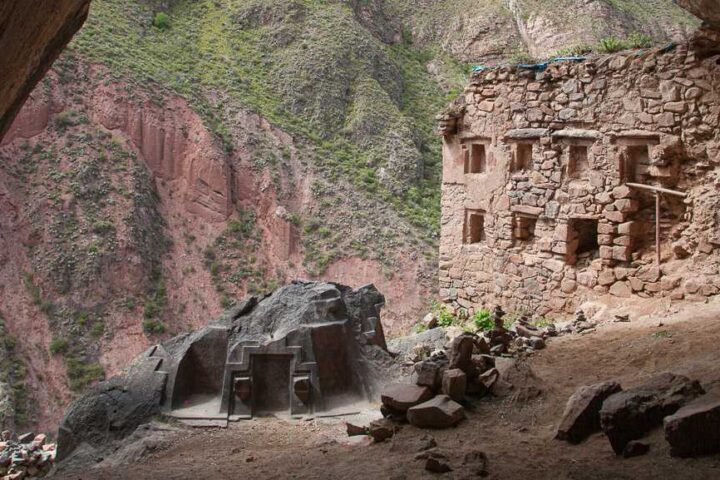 Representative Image. Ñaupa Iglesia cave shrine in Peru showing ancient stone architecture built into a natural rock formation with windows and niches carved into the mountainside.