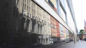 Reserve Bank of Australia building with "RESERVE BANK OF AUSTRALIA" signage visible on the exterior facade in downtown Sydney.