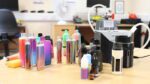 A pile of colorful, confiscated vape pens collected from secondary schools in England, many of which were found to contain dangerous synthetic cannabinoids.
