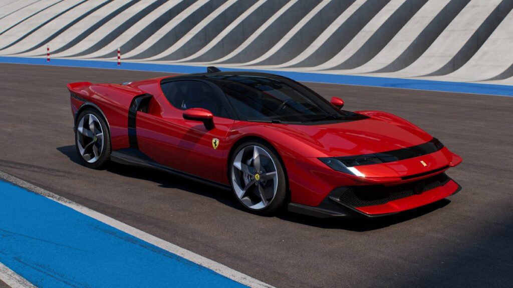 Red Ferrari 849 Testarossa front three-quarter view showing headlight design and front aerodynamics