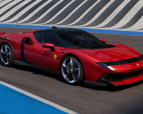Ferrari 849 Testarossa hybrid supercar in red with distinctive twin-tail rear design, front three-quarter view