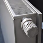 A home radiator providing warmth during winter, symbolizing heating support for pensioners.