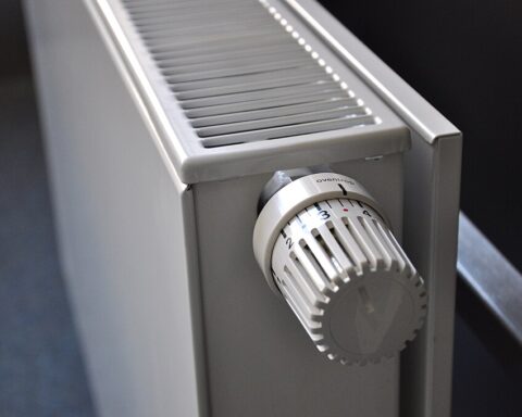 A home radiator providing warmth during winter, symbolizing heating support for pensioners.