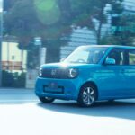 White Honda N-ONE e electric kei car on a dynamic driving course.