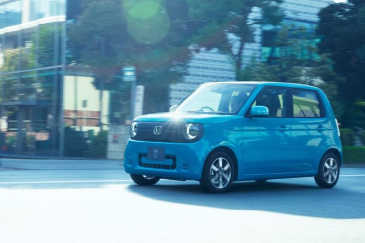 White Honda N-ONE e electric kei car on a dynamic driving course.