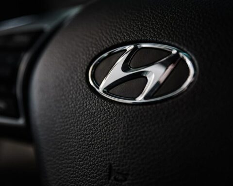 Hyundai car logo on silver vehicle exterior, representing vehicles affected by the safety recall