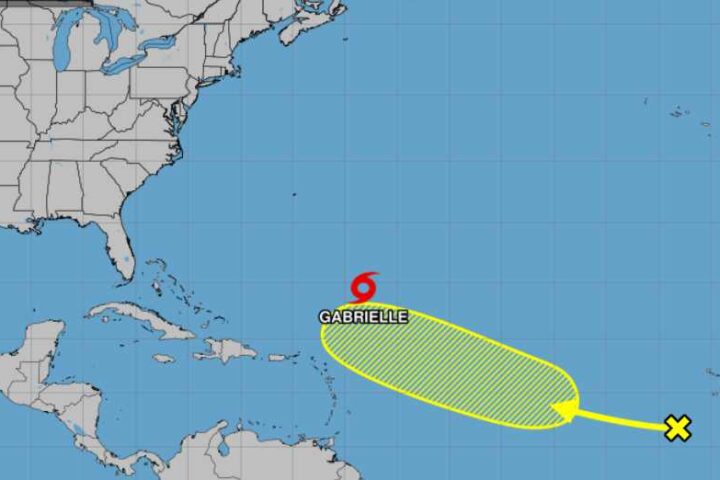 National Hurricane Center tracking map showing Tropical Storm Gabrielle in the Atlantic Ocean southeast of Bermuda with a yellow cone indicating its projected path northeastward.
