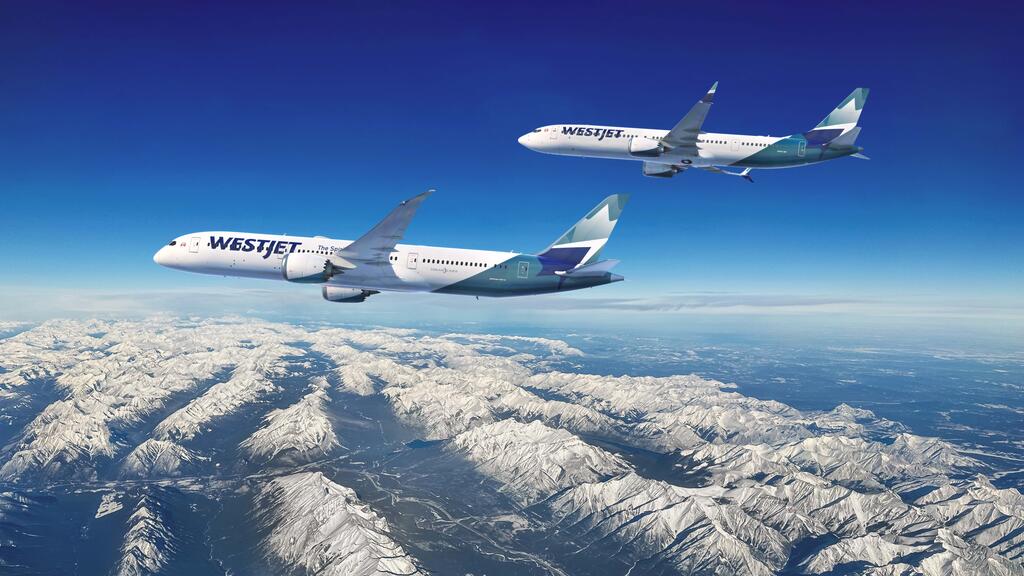 Two WestJet aircraft - a Boeing 737 in the foreground and a Boeing 787 Dreamliner in the background - flying over snow-capped mountains of the Canadian Rockies against a clear blue sky.
