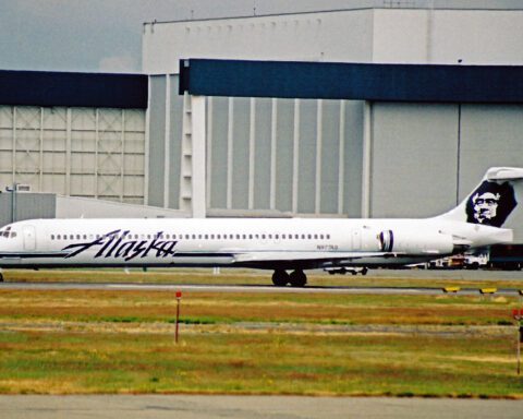 Alaska Airlines MD-83 (N977AS) at Vancouver International Airport, side view on the ramp.