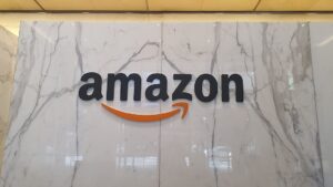 Amazon logo signage on an interior wall at the company’s Sydney office, photographed in April 2023 by Shkuru Afshar.