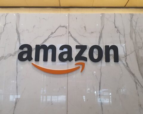 Amazon logo signage on an interior wall at the company’s Sydney office, photographed in April 2023 by Shkuru Afshar.