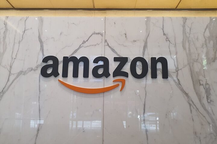 Amazon logo signage on an interior wall at the company’s Sydney office, photographed in April 2023 by Shkuru Afshar.