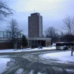 Snow-covered New York campus street during winter