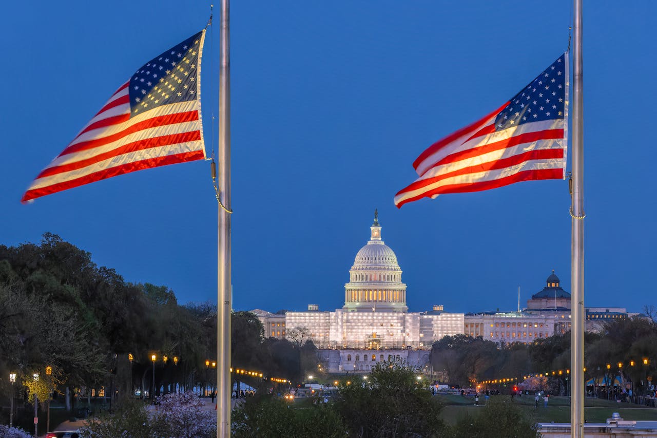 US flag flying near the White House at dusk, Washington, D.C. (Pexels License)