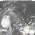 Satellite view of Hurricane Priscilla forming off Mexico’s coast with spiraling clouds and dense storm bands.