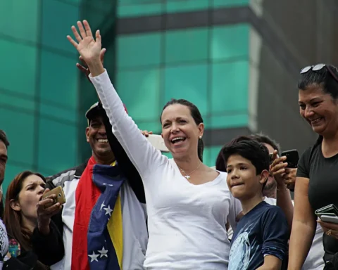 María Corina Machado addressing supporters at a 2019 Caracas march, symbolizing Venezuela’s democratic struggle.