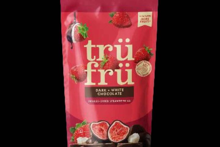 Three packages of Tru Fru freeze-dried strawberry products in bright red packaging with gold logo, showing the dark and white chocolate covered strawberry varieties that are subject to recall.