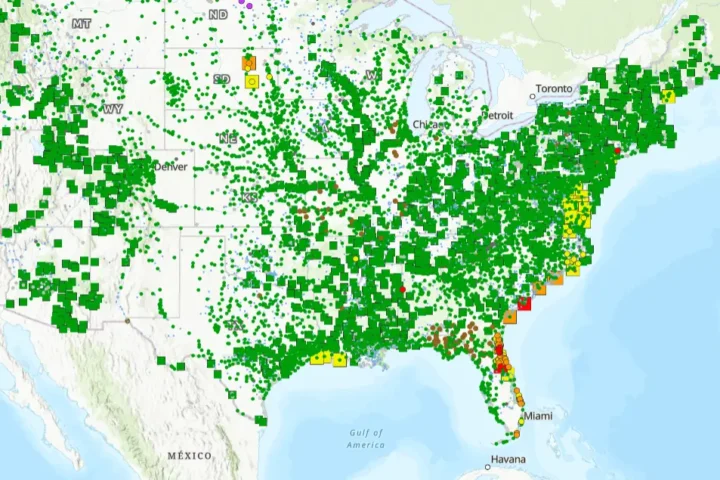 Flood inundation map from NOAA’s National Water Prediction Service showing flood risk markers across the southeastern United States.
