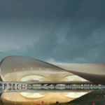 Banner image showing Navi Mumbai International Airport terminal design with modern architectural structure and landscape, released by Adani Airports.
